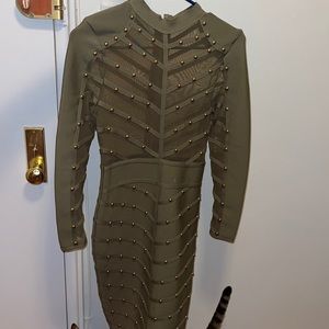 A stunning forest green see through dress